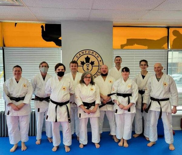 Students practicing karate in a dojo